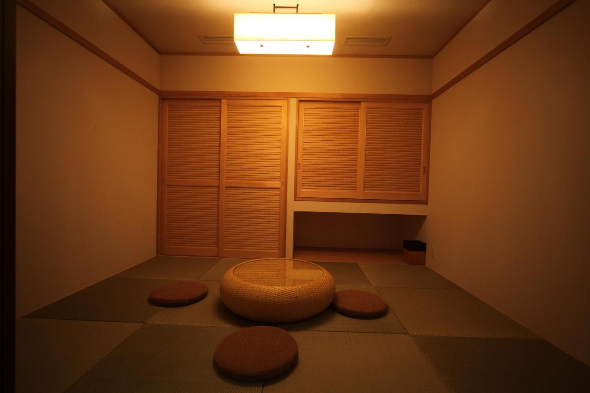 منتجع أمان سيكاي  بيبّ الغرفة الصورة A traditional Japanese room