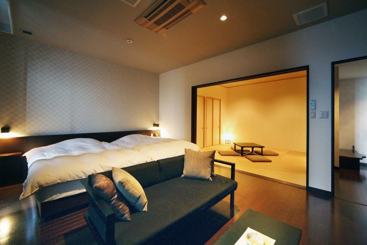 منتجع أمان سيكاي  بيبّ المظهر الخارجي الصورة A Japanese-style room with a futon